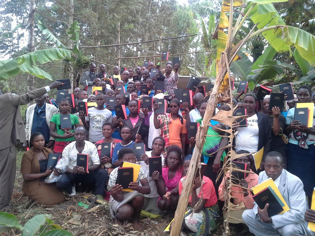 New Bibles raised at a Partner Symposium, 2017.