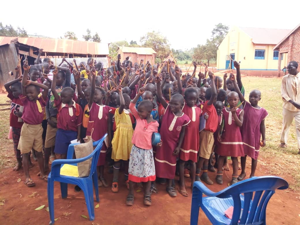 Seya Light children with new pencils, 2019.