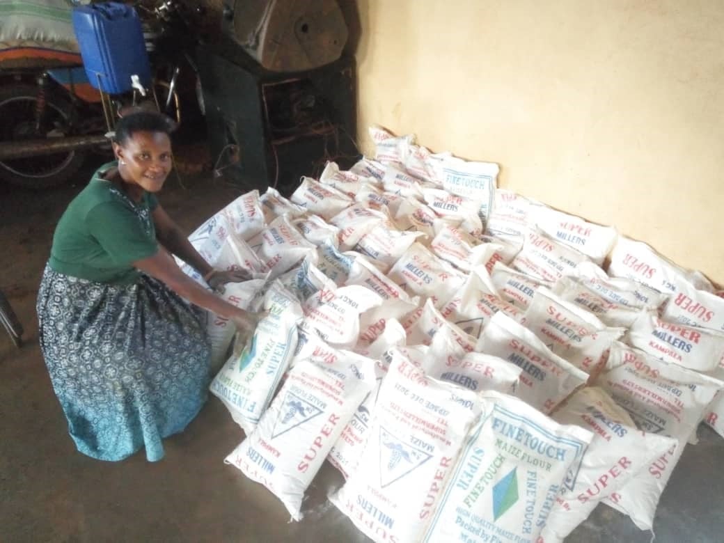 Annet with food sacks at Seya, 2020.