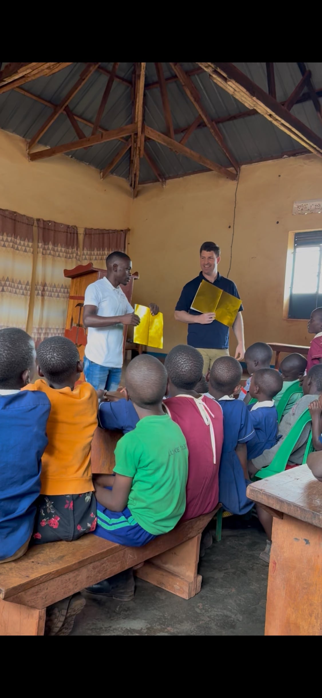 Teachers with yellow materials, 2025.