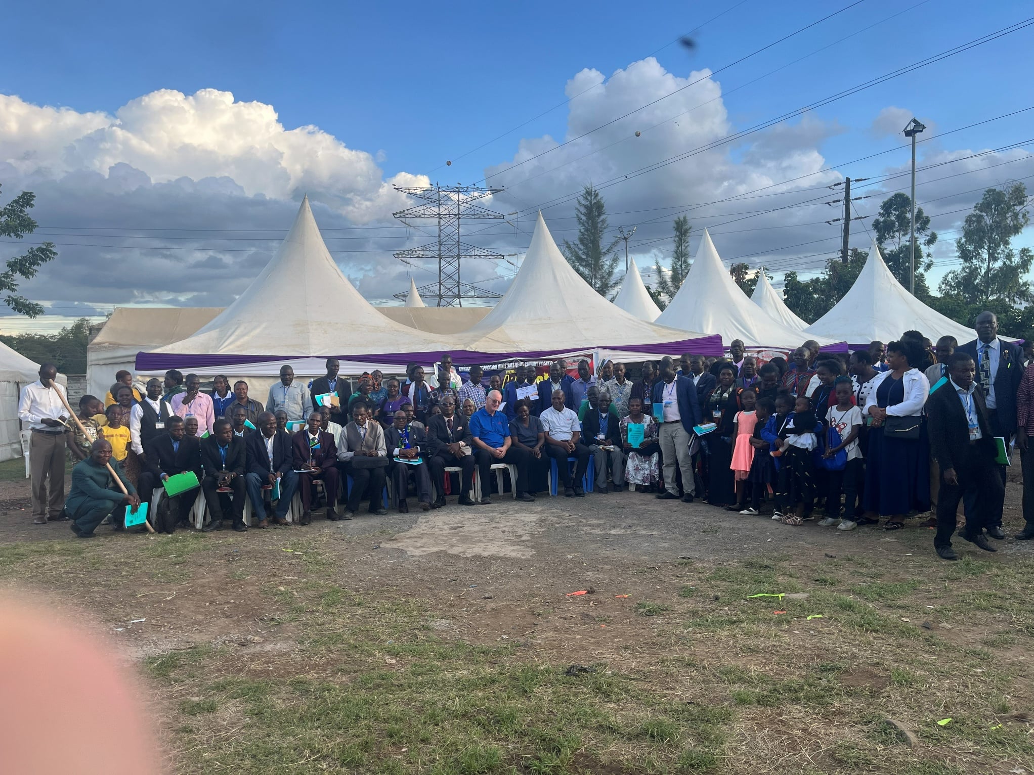 Group photo at the Kenya tents, 2026.