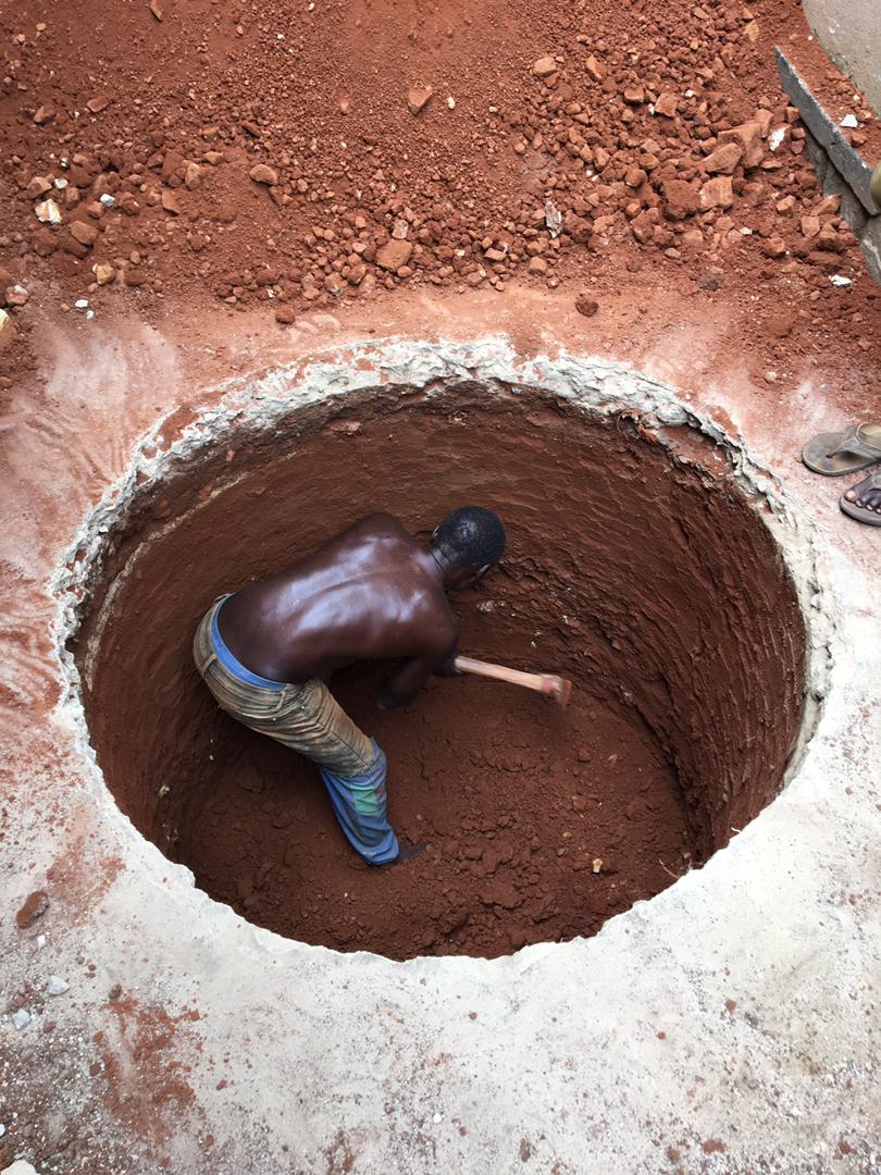 Digging the water well at Grace Community Center.