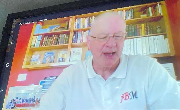 Mark Cooper teaching on a television screen during the Nairobi virtual Bible study training — pastors join on the same call.