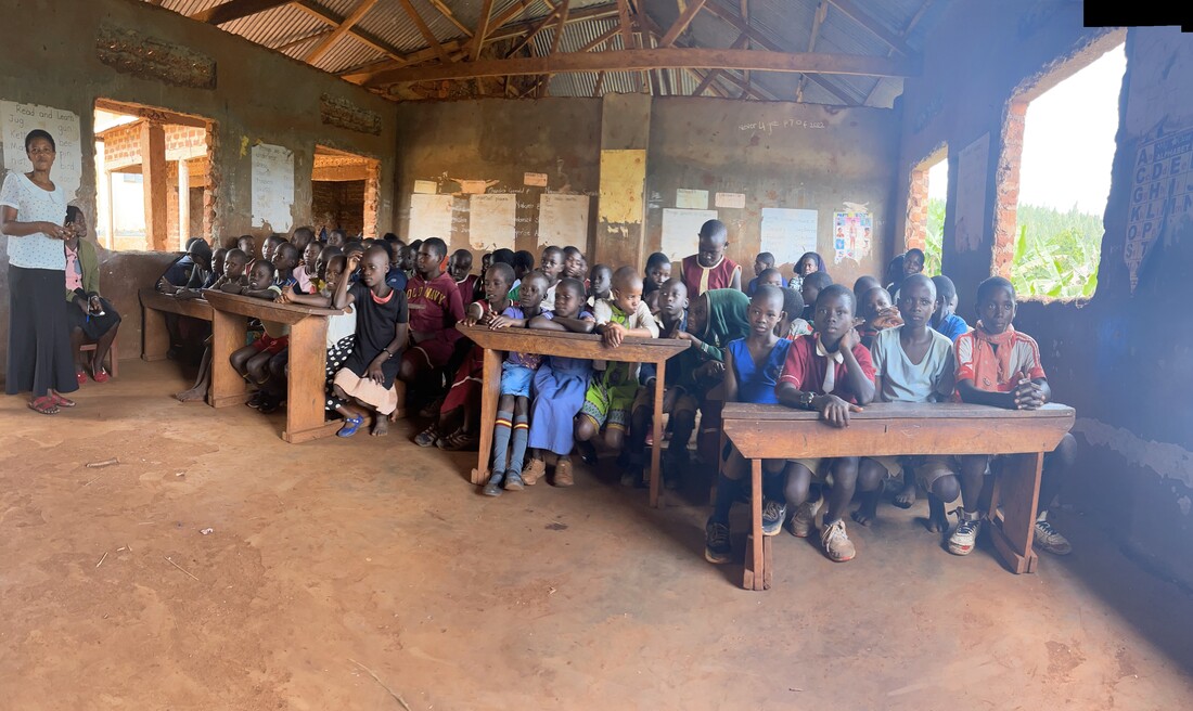 Teacher and children in a Seya Light classroom.