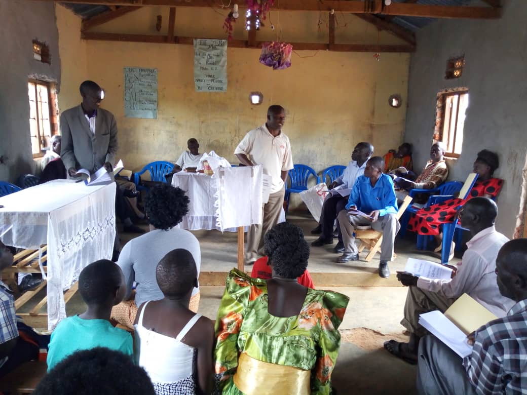 Pastor Josiah teaching pastors in a village church.