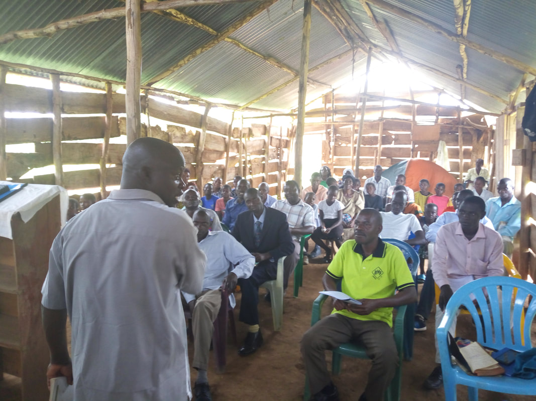 Pastor Josiah teaching despite illness, 2019.