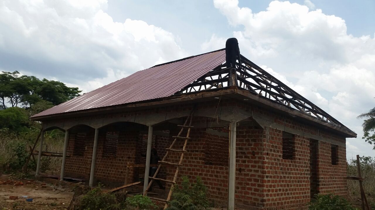 VHC administration building walls complete with roof framing starting.