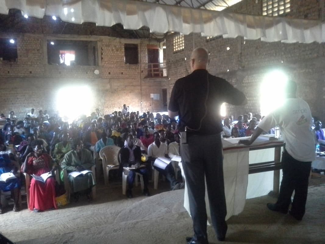 Mark teaching from the stage at Zion, 2017.