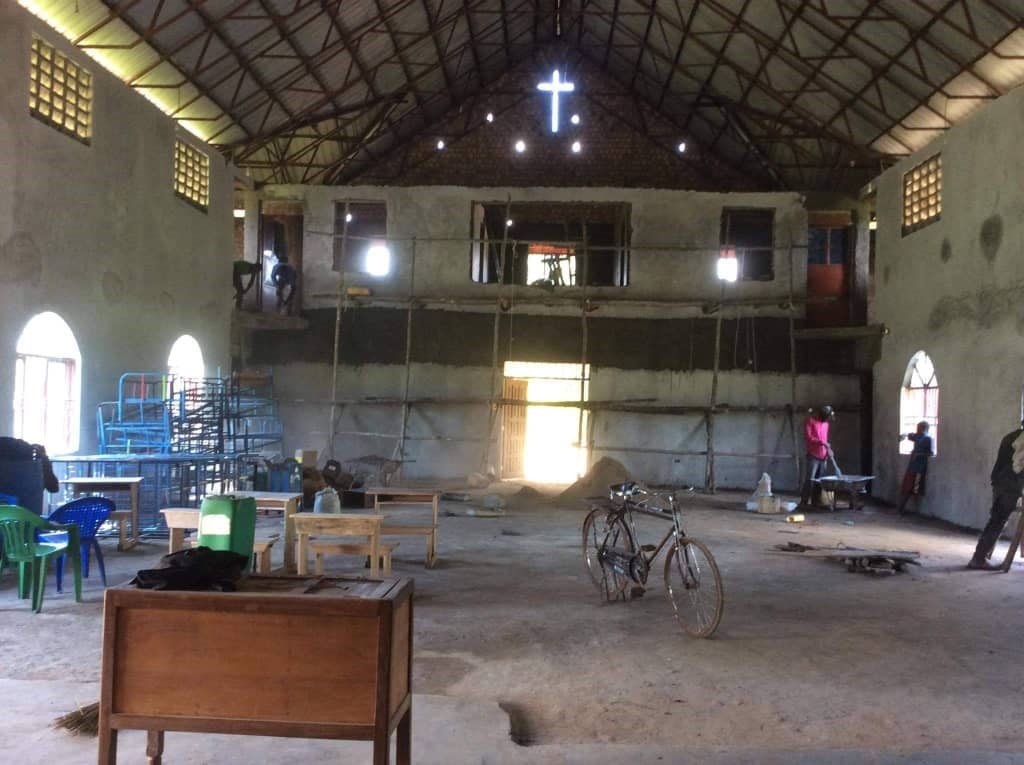 Plastering inside Zion's hall, 2020.